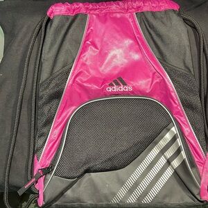 Pink and black Adidas drawstring sack pack